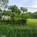 Tree blocking road and damaging electrical service