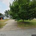 Report of pounding on garage door at Bates Avenue