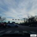 Flashing red traffic lights at Irving Park and Cumberland