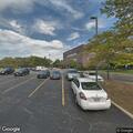 Vehicle hits parked car in bank parking lot