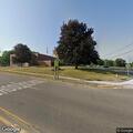 Officer checks white Jeep at Colon Elementary