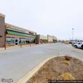 Woman screaming in parking lot at fitness business
