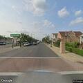 Male seated on bench appearing unwell at Pulaski and Sunnyside