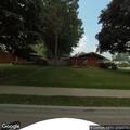 Men leave wheelbarrow in college yard and walk away