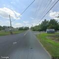Driver fails to stop in gray sedan near Newberry Road