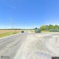 Report of vehicle possibly through guardrail by pond