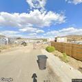 Unoccupied running vehicle blocking roadway