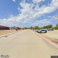 Cars doing burnouts at elementary school parking lot