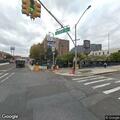 Homeless male sleeping near subway platform edge in Bronx