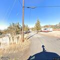 Semi truck hits sign and pole then leaves scene
