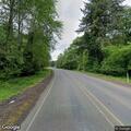Report of woman walking in roadway on state route