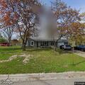 Loose dogs reported in front yard on Outer Drive