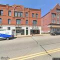 Female fallen into bushes on Main Street in Webster