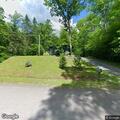 Tree blocking roadway on Woodland Valley Road