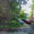 Hazardous partially cut trees at Marcel Lane home