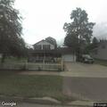 Officers check 911 open line at Main Street home