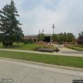 Person reported with severe headache near East Lake Avenue in Glenview