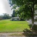 Neighbor property dispute at West Delaware home