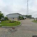 Disabled vehicle leaking fluid in police lot