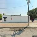 Vehicle blocking roadway near pizza restaurant