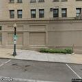 Person reported lying on the ground near Second St and Cherry St in Jamestown
