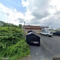 Vehicle hits fuel island and leaves scene