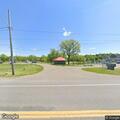 Man found breathing on ground outside bathrooms at park