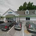 Person flailing in parked car at Cumberland Farms