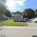 Smoking electrical wires near stop sign