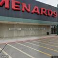 Person in black car possibly having heat stroke at store