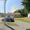 Low-hanging communication wire on Quincy Street