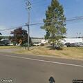 Two people seen trying to enter parked pickup truck