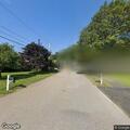 Live electrical wire down and sparking on street