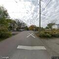 Person suffering heat-related illness at railroad crossing