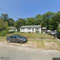 Female needs assistance carried from car to house