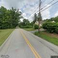 Large tree blocking road on Millbury Road