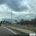 Windshield damaged by debris from dump truck