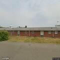 Man and woman in physical fight at motel room