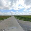 Deceased deer blocking roadway on 130th Street