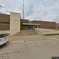 Unconscious woman breathing at jail in Vinton