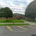 Suspicious car with bikes near elementary school