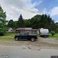 Vehicle damages lawn, mailbox, and truck in hit-and-run