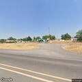 Neighbor throwing items and hitting trailer
