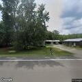Small brush fire near Route 34 with people nearby