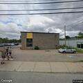 Suspicious person and running car at auto shop