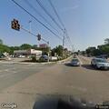 Disabled vehicle blocking center lane near bank