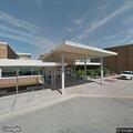 Person reported in black van at high school parking lot