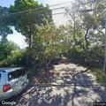 Neighbor reports squatter in Garfield Street home