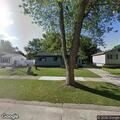 Small backyard grass or trash fire in Romulus