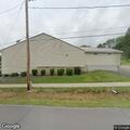 Car hits deer in front of American Legion